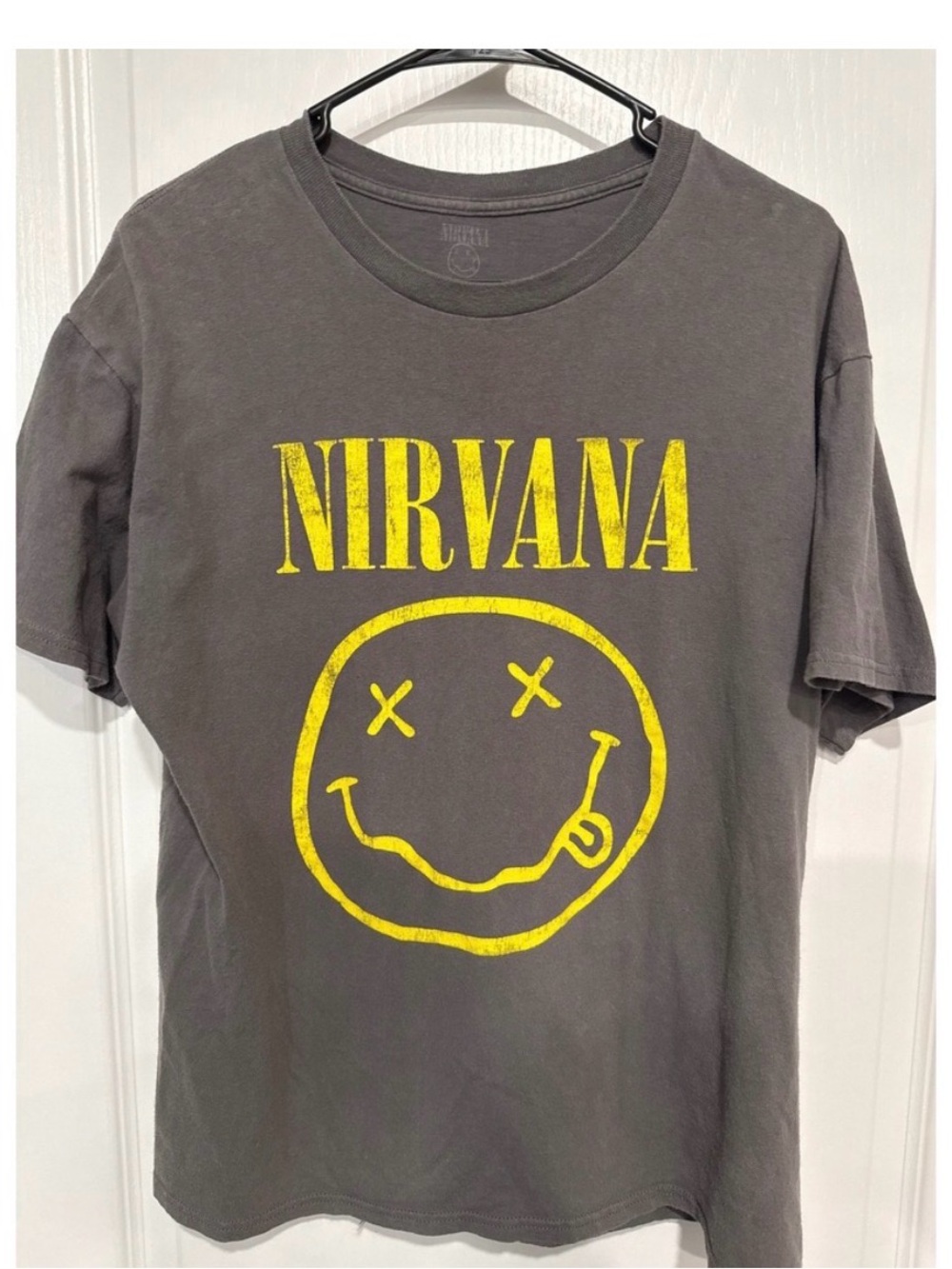NIRVANA Charcoal Tee with Yellow Smiley Graphic